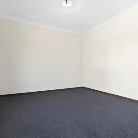 Rent this 3 bed apartment on 8 Anzac Mews in Wattle Grove NSW 2173, Australia