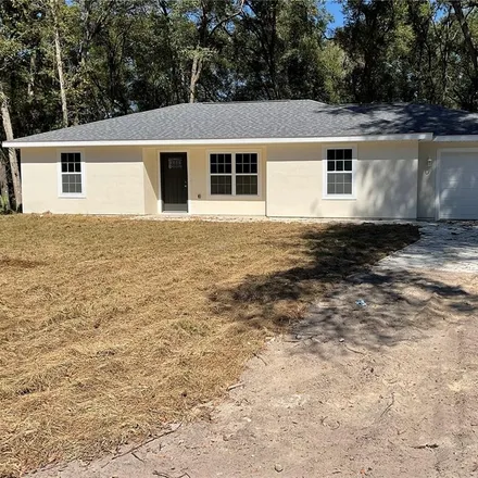 Buy this 3 bed house on 3911 Southeast 143rd Place in Marion County, FL 34491
