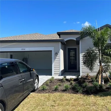 Rent this 4 bed house on Tortuga Cay Drive in North Port, FL