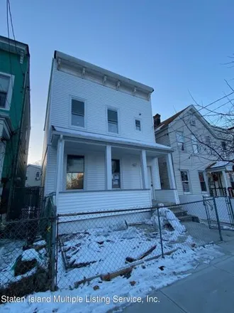 Buy this 5 bed house on 86 Warren Street in New York, NY 10304