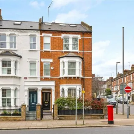 Buy this 4 bed townhouse on Parkgate Road in London, SW11 4NA