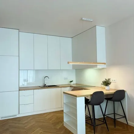 Rent this 3 bed apartment on Adama Branickiego in 02-790 Warsaw, Poland
