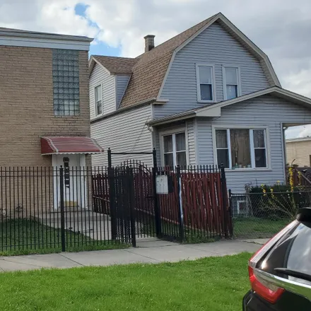 Buy this 8 bed duplex on 5024-5026 North Harding Avenue in Chicago, IL 60625