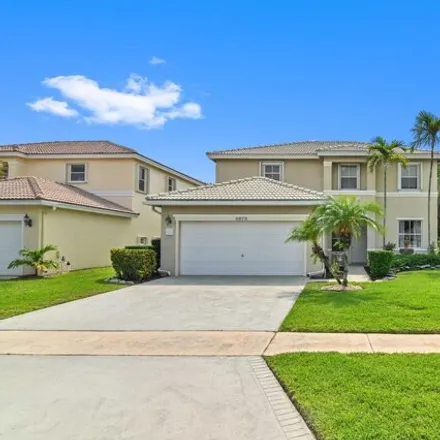 Buy this 4 bed house on 6685 Spring Meadow Drive in Greenacres, FL 33413