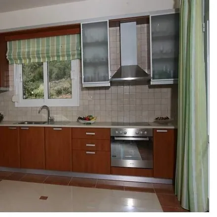 Rent this 13 bed house on Agía Pelagía in Piraiós, Greece