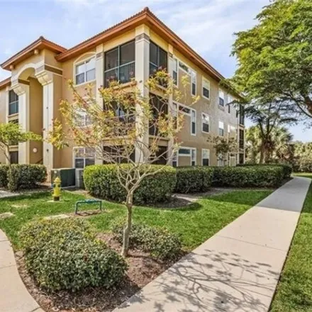 Buy this 1 bed condo on Spring Creek Elementary School in Colonnades Court West, Pelican Landing