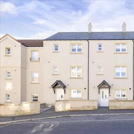 Buy this 4 bed townhouse on 7 Wymet Gardens in Millerhill, EH22 1FL