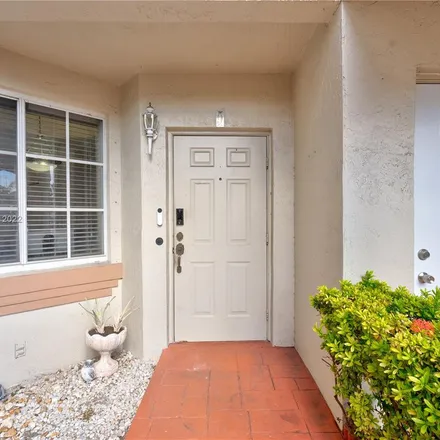 Rent this 3 bed apartment on 8336 Northwest 10th Street in Miami-Dade County, FL 33126