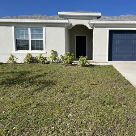 Rent this 4 bed house on 818 San Filippo Drive Southeast in Palm Bay, FL 32909