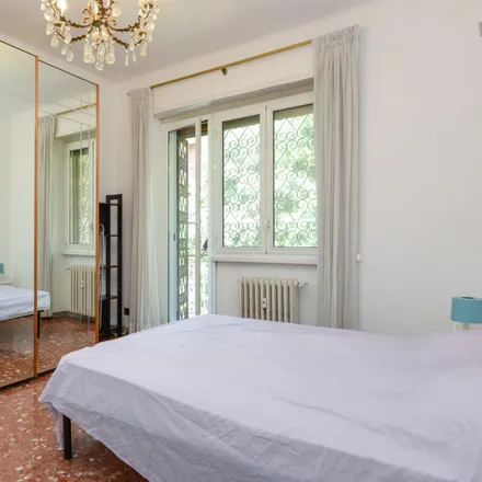Rent this 6 bed room on Via Dodecaneso 9 in 00144 Rome RM, Italy