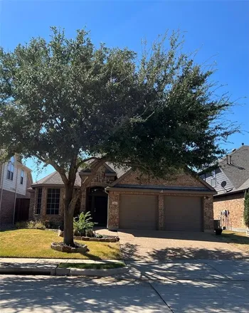 Rent this 3 bed house on 7067 Surfside Lane in The Cove, Grand Prairie