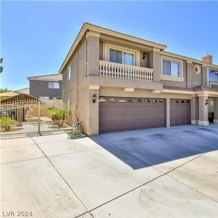 Rent this 4 bed house on 599 East Campus Oaks Court in Paradise, NV 89183
