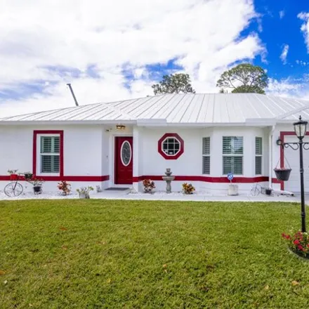 Buy this 4 bed house on 1202 Southeast Ladner Street in Port Saint Lucie, FL 34983