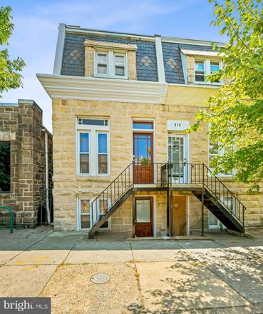 Rent this 3 bed townhouse on 313 West 30th Street in Baltimore, MD 21211