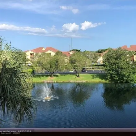 Rent this 2 bed condo on 7690 Westwood Drive in Tamarac, FL 33321