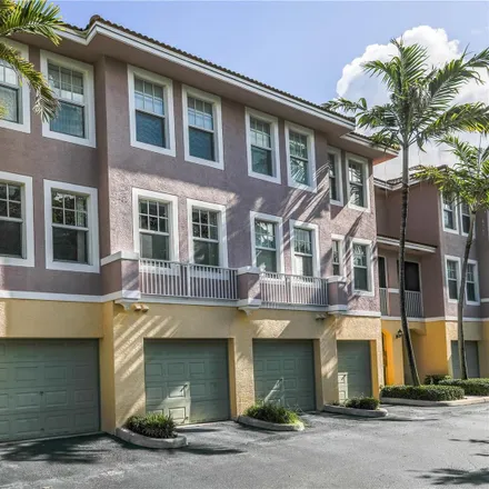 Rent this 2 bed townhouse on 6380 West Sample Road in Coral Springs, FL 33067