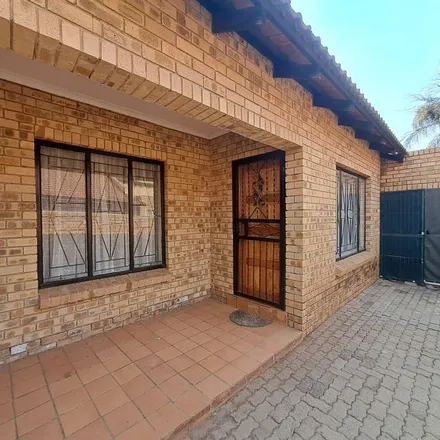 Rent this 2 bed townhouse on Retief Goosen Gholf Academy in Voortrekker Street, Penina Park