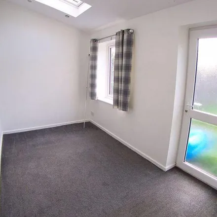 Rent this 3 bed townhouse on Gardeners Court in Leeds, LS10 1ED