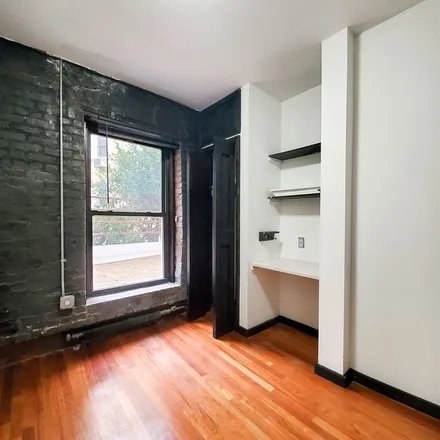 Rent this 4 bed apartment on 403 East 11th Street in New York, NY 10009