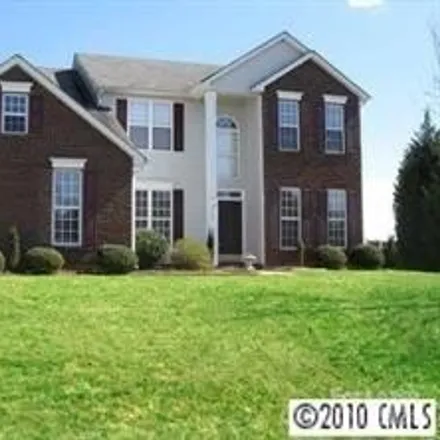 Rent this 4 bed house on 1454 Crestgate Drive in Wesley Chapel, Union County