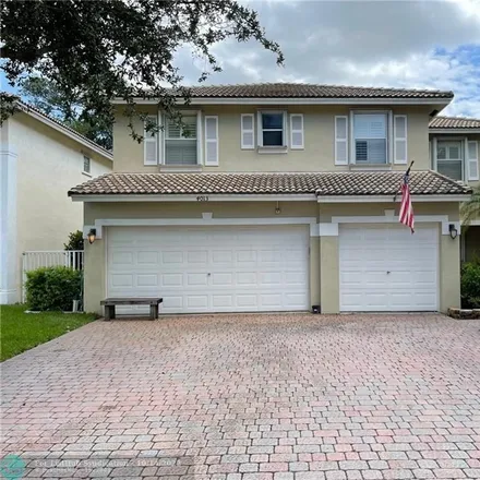 Buy this 5 bed house on 4013 Northwest 63rd Street in Coconut Creek, FL 33073