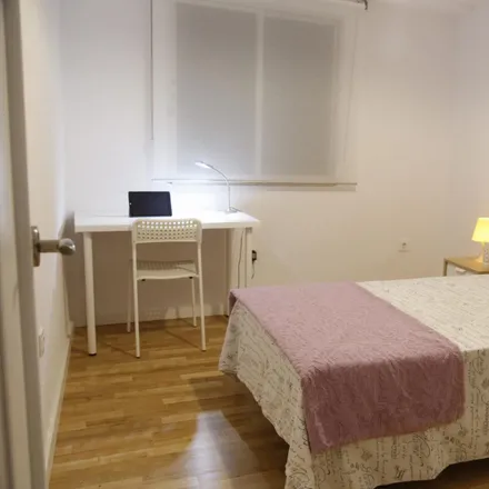 Rent this 4 bed room on Carrer Sant Roc in 46113 Moncada, Spain