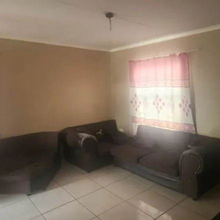 Rent this 2 bed apartment on unnamed road in Devland, Soweto