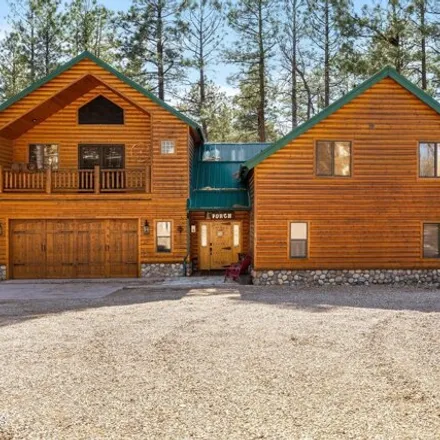 Buy this 4 bed house on 2631 Bobcat Gulch in Pinetop, Arizona
