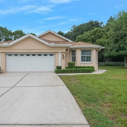 Buy this 3 bed house on 5695 Legend Hills Lane in Spring Hill, FL 34609