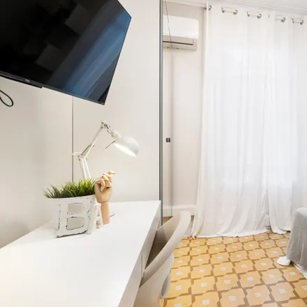 Rent this 5 bed room on Carrer de Nàpols in 147, 08013 Barcelona