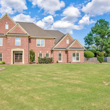 Buy this 4 bed house on 9108 Grovelawn Cove East in Germantown, TN 38139