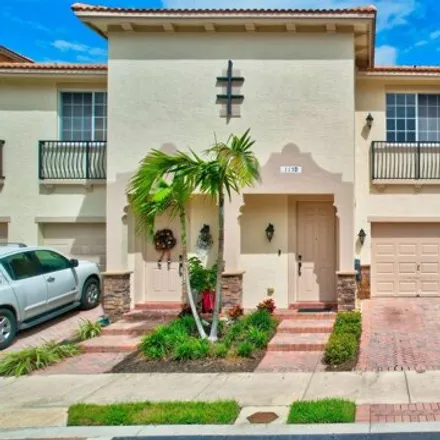 Buy this 3 bed house on 1098 West Longport Circle in Delray Beach, FL 33444