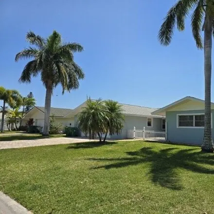 Buy this 5 bed house on 345 West Osceola Lane in Cocoa Beach, FL 32931