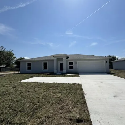 Buy this 3 bed house on 2486 Southwest Bayshore Boulevard in Port Saint Lucie, FL 34984
