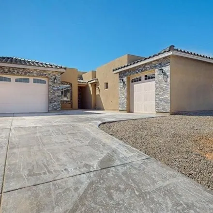 Buy this 5 bed house on 943 Starry Sky Avenue Northeast in Rio Rancho, NM 87144