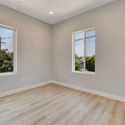 Rent this 4 bed apartment on 4549 Saturn Street in Los Angeles, CA 90019
