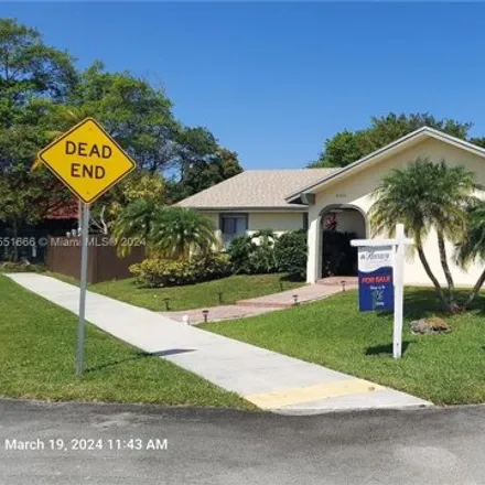 Buy this 4 bed house on 8899 Paradise Drive in Tamarac, FL 33321