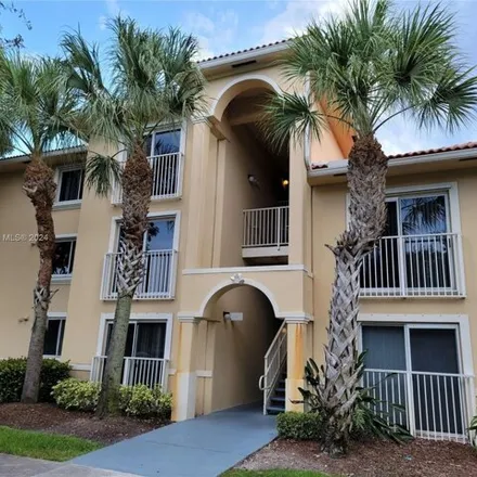 Rent this 2 bed condo on 9907 Westwood Dr Unit 15-2 in Tamarac, Florida