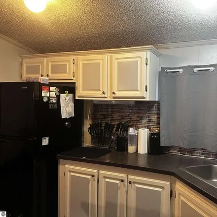 Image 4 - 2480 Countrywood Court, Garfield Charter Township, MI 49686, USA - Apartment for sale