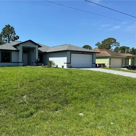 Buy this 4 bed house on 4177 35th Street Southwest in Lehigh Acres, FL 33976