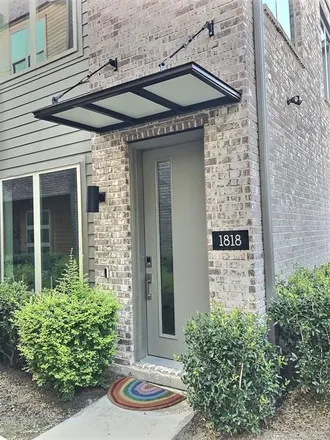 Buy this 2 bed townhouse on 3299 North Hall Street in Dallas, TX 75204
