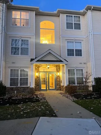 Rent this 2 bed condo on Saint Andrews Place in Manalapan Township, NJ