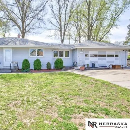 Buy this 3 bed house on 5125 Hartman Avenue in Omaha, NE 68104