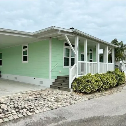 Rent this 2 bed house on 199 Northeast Portside Drive in Ocean Breeze, Martin County