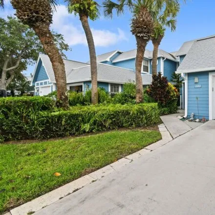 Rent this 3 bed townhouse on 1136 Ocean Dunes Circle in Jupiter, FL 33477
