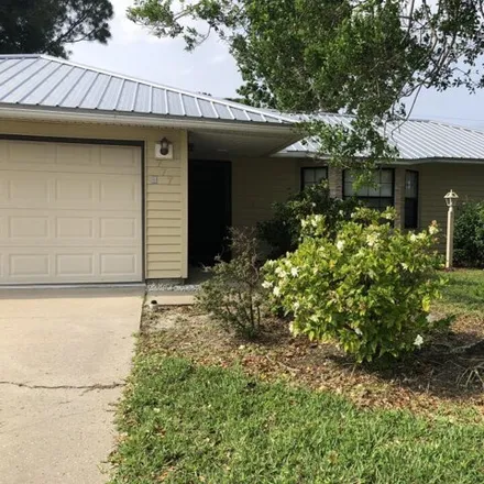 Buy this 3 bed house on 805 Hamm Street Northwest in Palm Bay, FL 32907