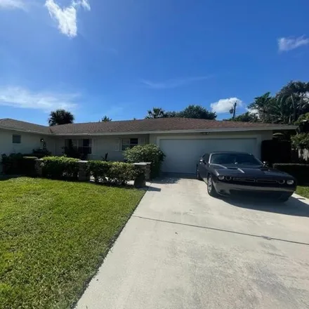 Buy this 3 bed house on 1854 Caribbean Road in Lake Clarke Shores, Palm Beach County