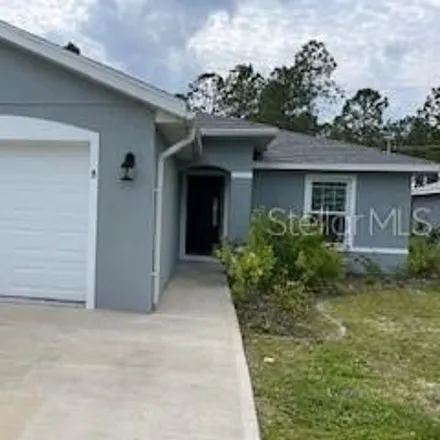 Rent this 3 bed house on 57 Freneau Lane in Palm Coast, FL 32137