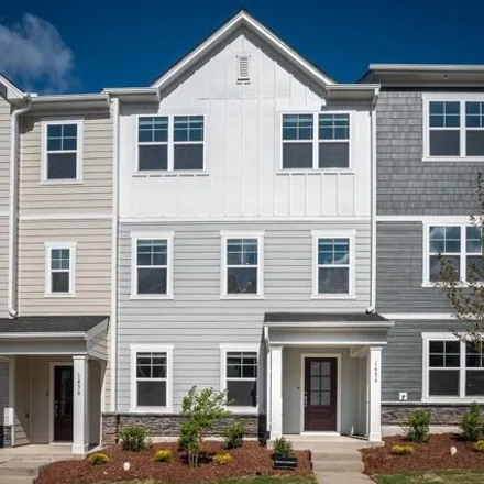 Rent this 4 bed townhouse on Rosepine Drive in Cary, NC 27519