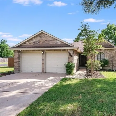Rent this 4 bed house on 7904 Cahill Drive in Austin, TX 78729
